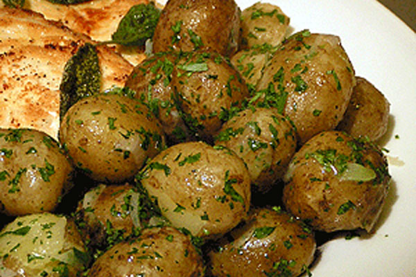 new potatoes, sauteed with butter, parsley and spring onions